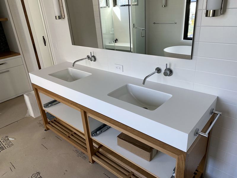 Floating double-sink vanity with integrated top